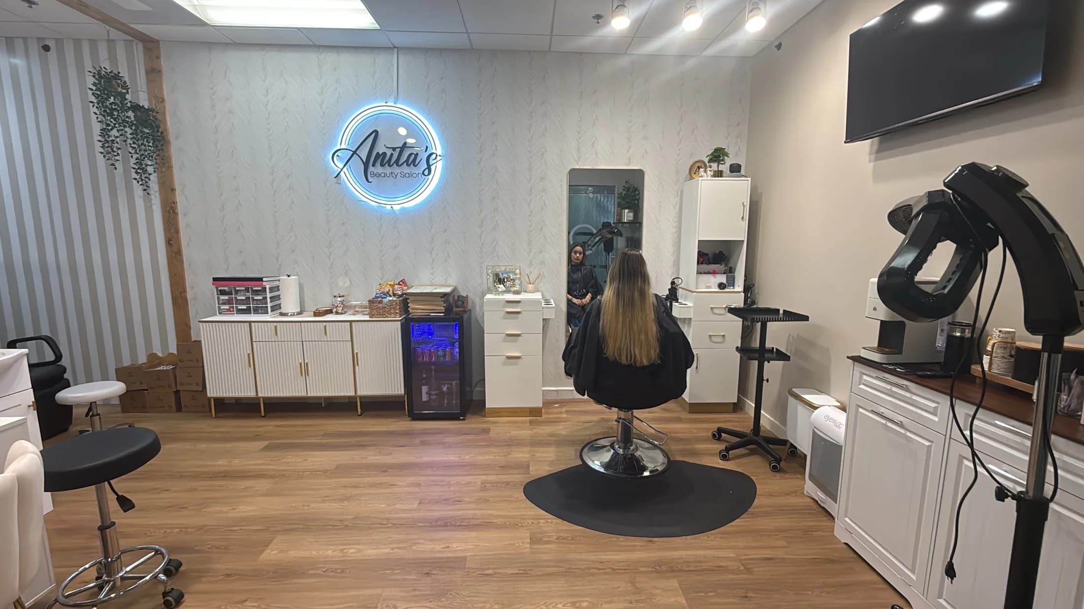 Inside Anita's Beauty hair salon with the brand neon sign, Germantown TN