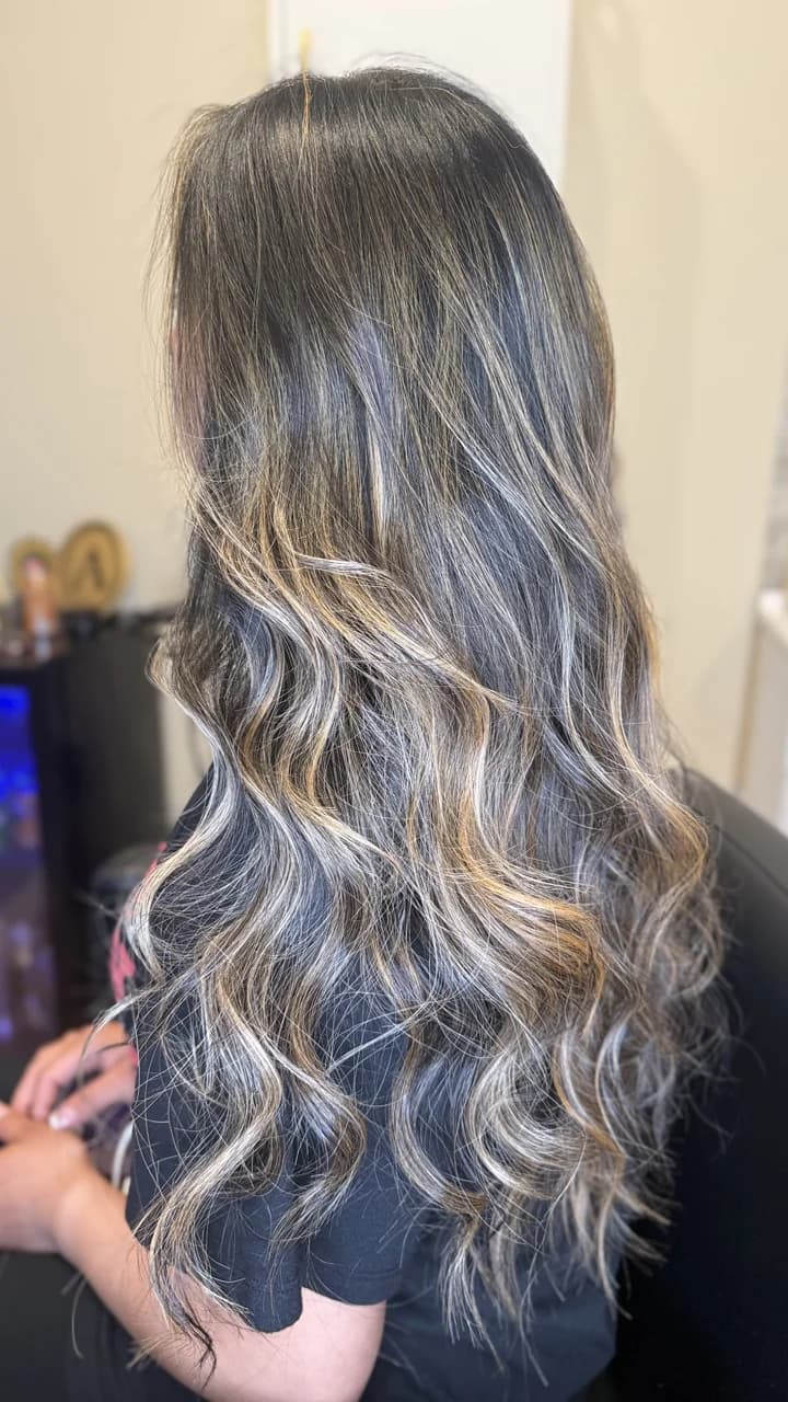 Natural balayage with soft waves and shine at Anita's Beauty, Germantown TN